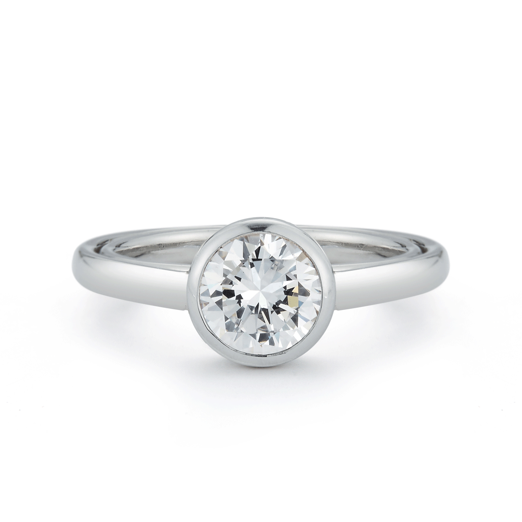 Shop the Entre Nous Bezel Set Omega Diamond Solitaire Engagement Ring Online